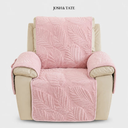 Josh & Tate - PalmSoft™ Quilted Chair Cover - Pink textured chair cover on a beige armchair with 'Josh & Tate' branding.