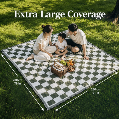 Josh & Tate - PicnicCo™ Woven Outdoor Blanket - Family sitting on a large checkered picnic blanket with measurements displayed, set against a grassy background.