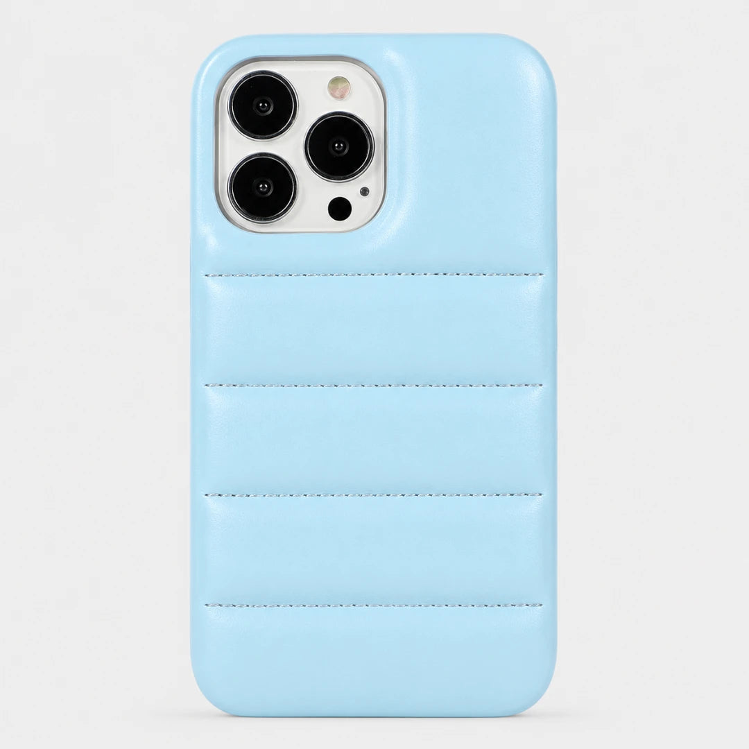 Light blue phone case with card holder on a light gray background