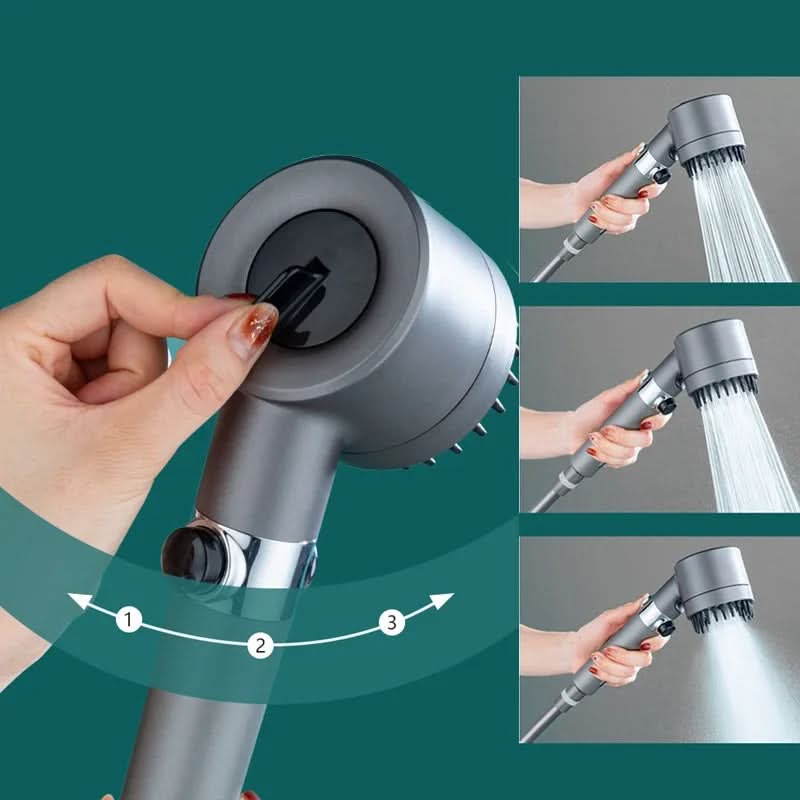 Handheld shower head with multiple nozzles and a hand holding it, on a green background.
