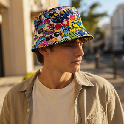 Josh & Tate - PrintedBucket™ Graffiti  Hat - A man wearing a colorful graffiti-print bucket hat, standing outdoors in a sunny urban setting.