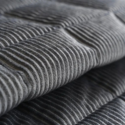 Josh & Tate - QuiltDrape™ Corduroy Sofa Cover - Close-up of gray ribbed fabric texture