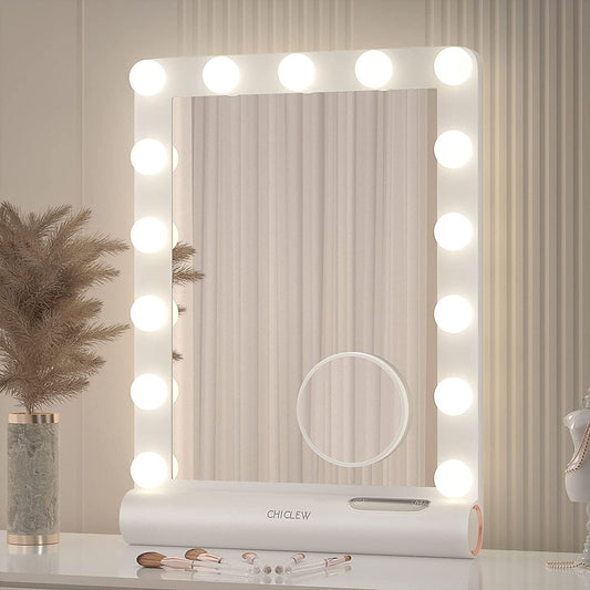 Makeup mirror with light bulbs on a neutral background