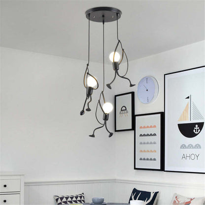 Modern ceiling light fixture with three bulbs in a room with decorative wall art.