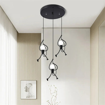 Modern pendant light fixture hanging from the ceiling in a room with neutral walls and decor.