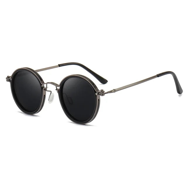 Round sunglasses with dark lenses and thin metal frame on a white background