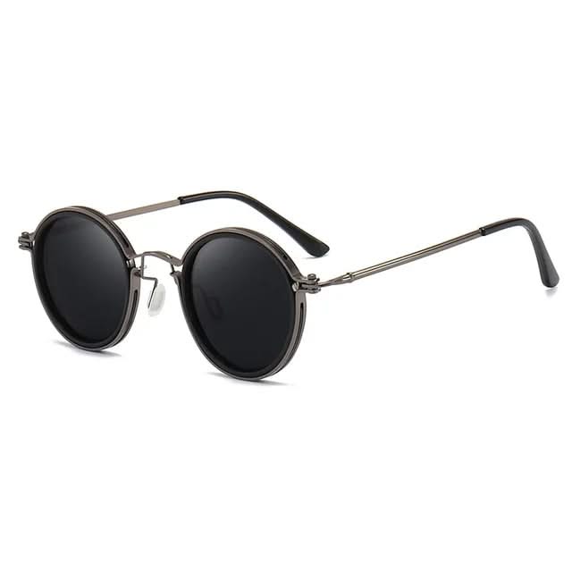 Round sunglasses with dark lenses and thin metal frame on a white background