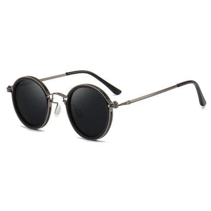 Round sunglasses with dark lenses and thin metal frame on a white background