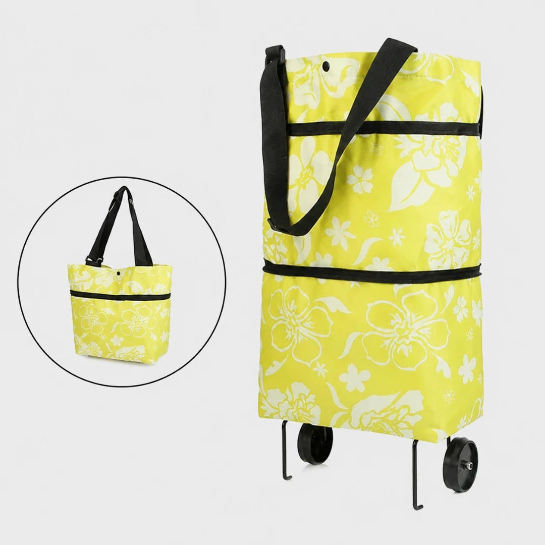 Josh & Tate - ReusableCart™ Foldable Shopping Bag - Yellow and white floral rolling tote bag with black handles and wheels, shown on a light gray background with a circular inset of the bag folded flat.