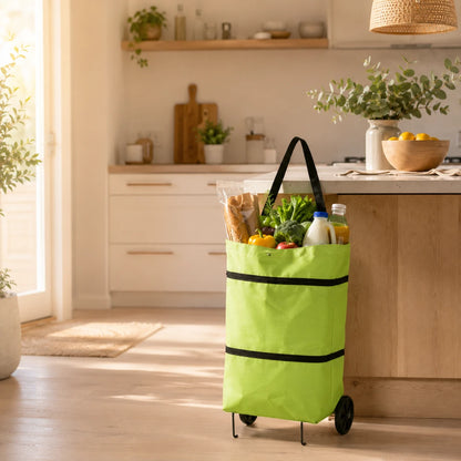 Josh & Tate - ReusableCart™ Foldable Shopping Bag - A bright lime green fabric rolling grocery tote bag with black handles and black trim, filled with groceries, standing in a sunlit modern kitchen.