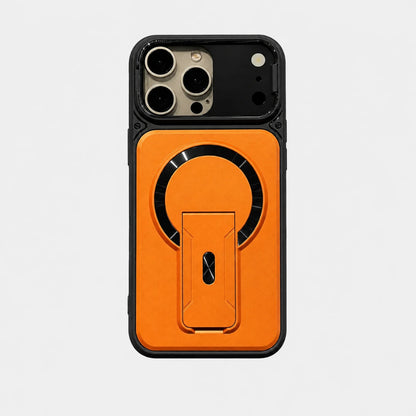 Josh & Tate - RingArmor™ MagSafe iPhone Case - An orange and black protective phone case with a built-in kickstand and MagSafe ring, shown on a light gray background.