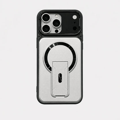 Josh & Tate - RingArmor™ MagSafe iPhone Case - A protective phone case with a black bumper and a silver magnetic ring holder on the back, shown on a light gray background.