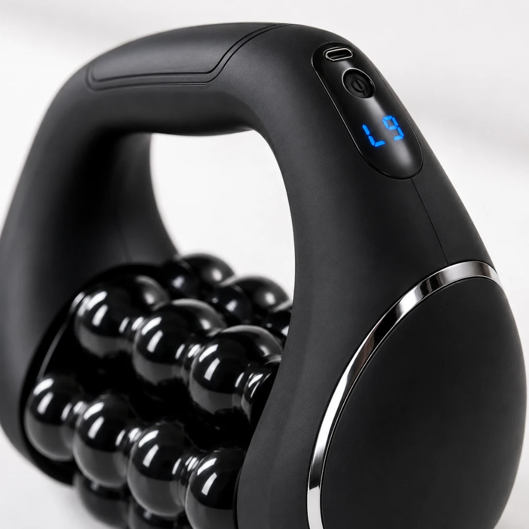 Josh & Tate - RollFlex™ 360 Full-Body Massager - Close-up of a black handheld massage device with a curved handle, glossy black beaded roller balls, and a small blue digital display on a light gray background.