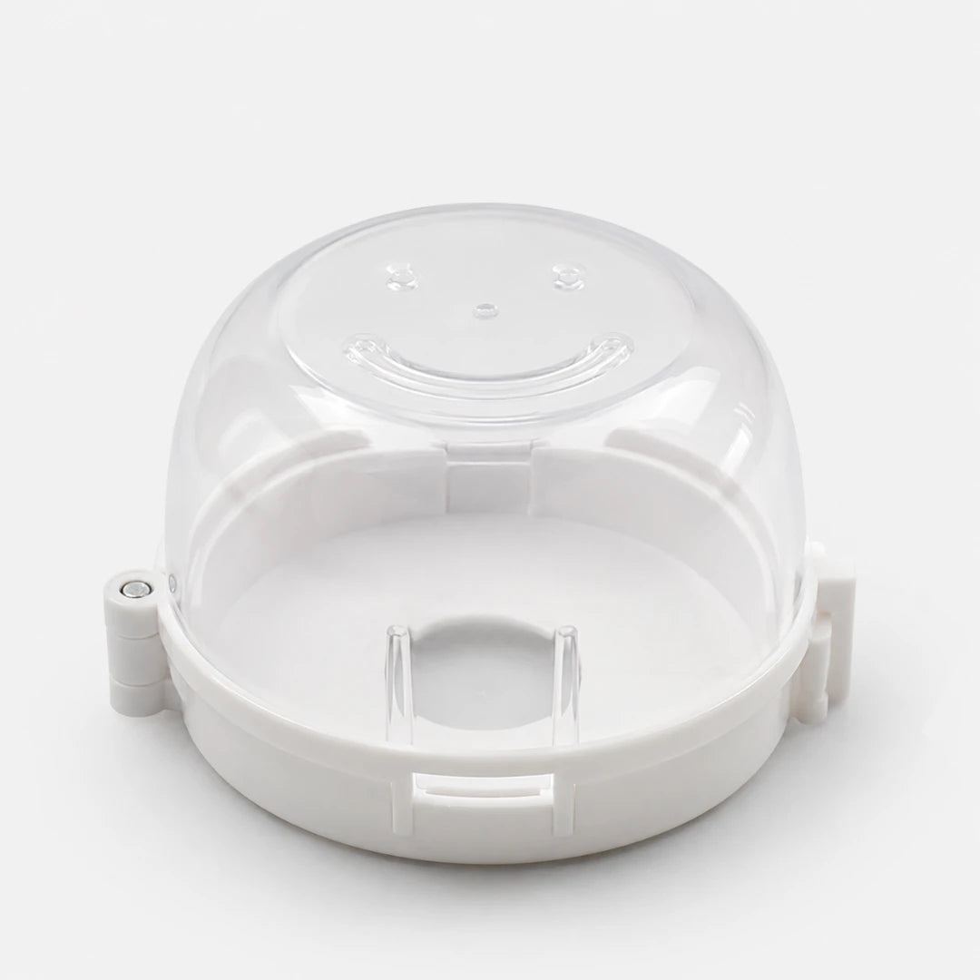 Josh & Tate - SafeKnob™ Child Safety Stove Covers - A clear plastic dome lid with a white base, designed as a replacement part, shown on a light gray background.