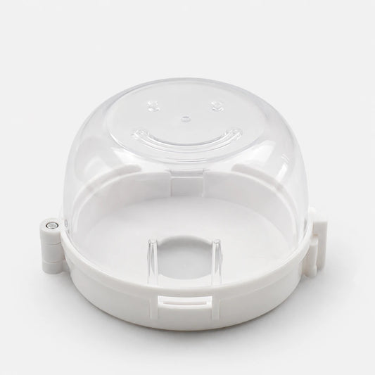 Josh & Tate - SafeKnob™ Child Safety Stove Covers - A clear plastic dome lid with a white base, designed as a replacement part, shown on a light gray background.