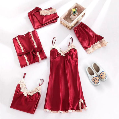 Red satin nightgown set with lace details on a white background