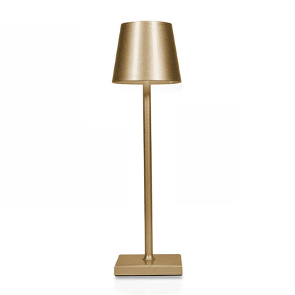 Gold table lamp on a white background