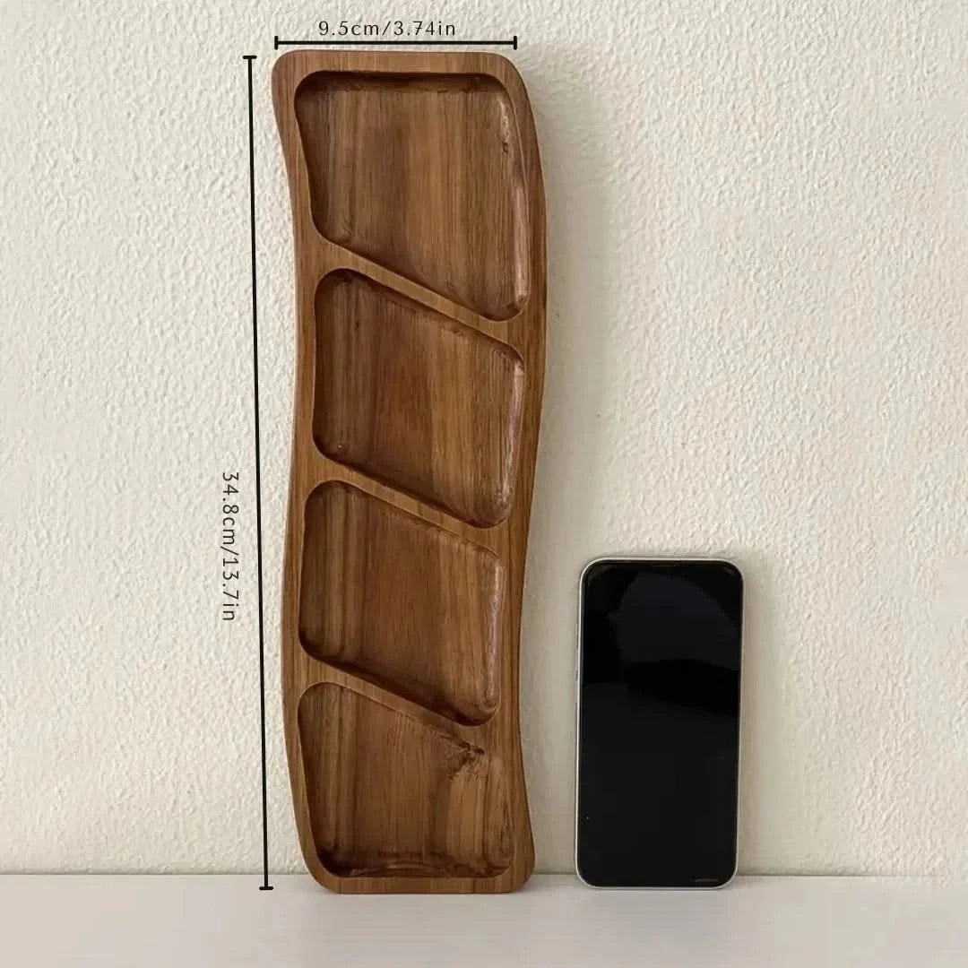 Josh & Tate - Sectioned Wooden Serving Tray - Wooden tray with divided sections next to a smartphone on a white surface