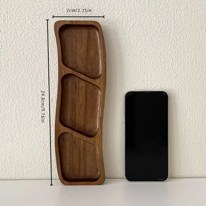 Josh & Tate - Sectioned Wooden Serving Tray - Wooden tray with compartments next to a smartphone on a white surface