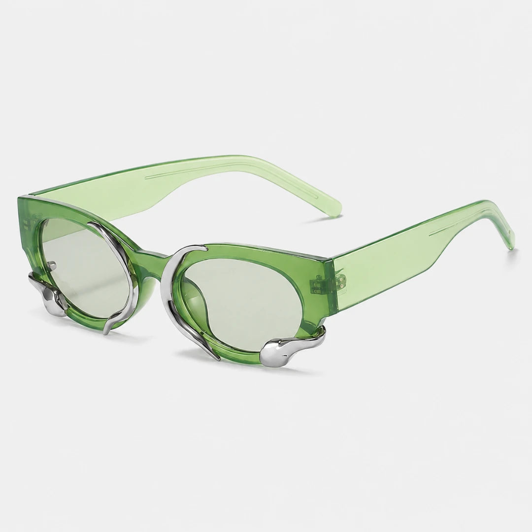 Josh & Tate - SerpentEdge™ Statement Sunglasses - Green translucent sunglasses with a unique angular frame design and silver metal nose pads, shown on a light gray background.