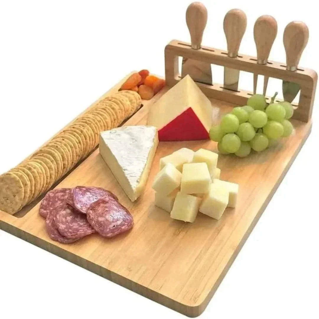 Josh & Tate - Serving Board Set with Built-In Knife Holder - Wooden cheeseboard with assorted cheeses, crackers, and fruits on a white background