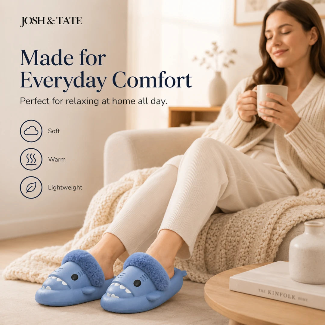 Josh & Tate - SharkStep™ Plush Slip-On Slipper - Woman wearing blue slippers with text about comfort and features, sitting on a couch holding a mug.