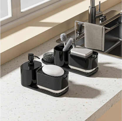 Black bathroom accessories set on a countertop with a sink in the background