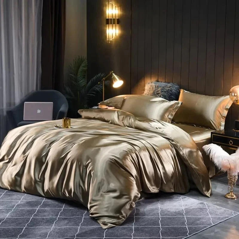 Luxurious bedroom with satin bedding, lamp, and decor.