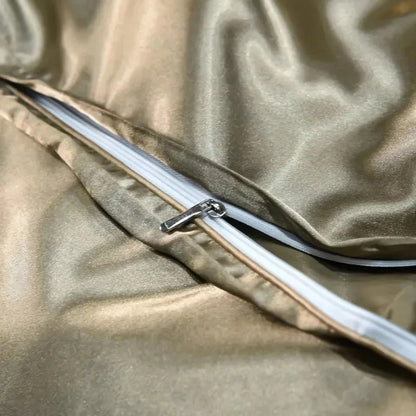 Close-up of a gold satin fabric with a zipper