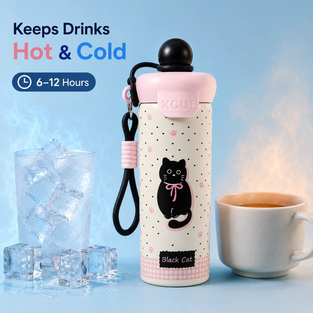 Josh & Tate - SnugPop™ Cute Insulated Tumbler - A reusable insulated drink bottle with a pink lid and a black cat illustration on a white body, shown with a carrying strap. The bottle is centered against a light blue background with promotional text reading 'Keeps Drinks Hot & Cold' and '6-12 Hours.