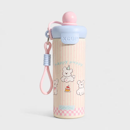 Josh & Tate - SnugPop™ Cute Insulated Tumbler - A cute pink and light blue insulated water bottle with a wrist strap, decorated with cartoon puppy illustrations and the text 'Happy Puppy' and 'Cake Dog'.