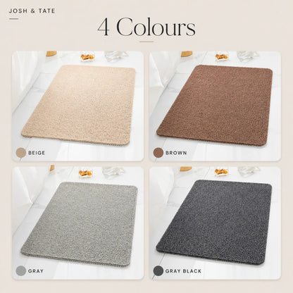 Josh & Tate - SoftStep™ Anti-Slip Bath Mat - Four color swatches labeled 'Beige', 'Brown', 'Gray', and 'Gray Black' on a beige background.