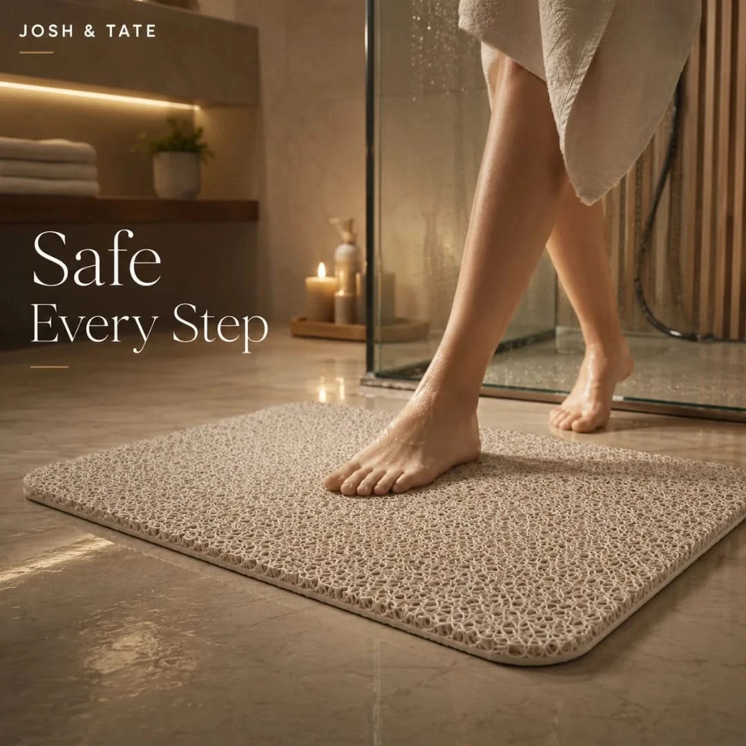 Josh & Tate - SoftStep™ Anti-Slip Bath Mat - Person stepping onto a textured bath mat with 'Safe Every Step' text and 'Josh & Tate' branding.