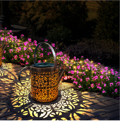 Decorative lantern casting shadows on a garden path with pink flowers in the background