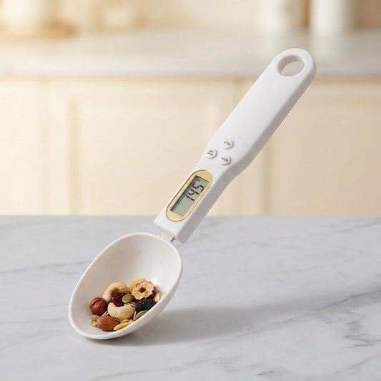 Josh & Tate - SpoonScale™ Smart Measuring Spoon - Digital measuring spoon with a digital display on a marble surface