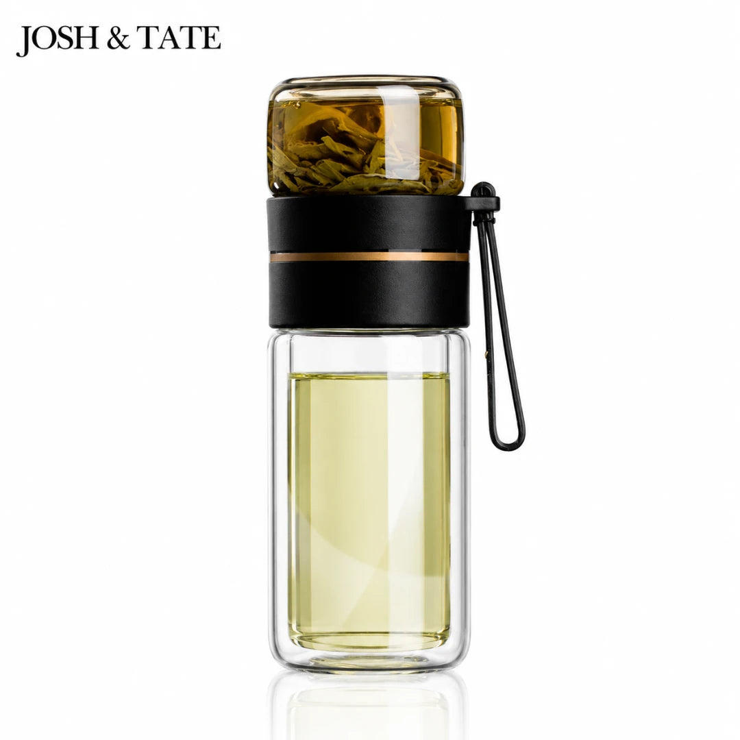 Josh & Tate - SteepSeal™ Tea-Water Separation Bottle - Glass water bottle with black lid and handle on a white background, featuring the brand 'Josh & Tate'.