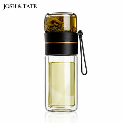 Josh & Tate - SteepSeal™ Tea-Water Separation Bottle - Glass water bottle with black lid and handle on a white background, featuring the brand 'Josh & Tate'.