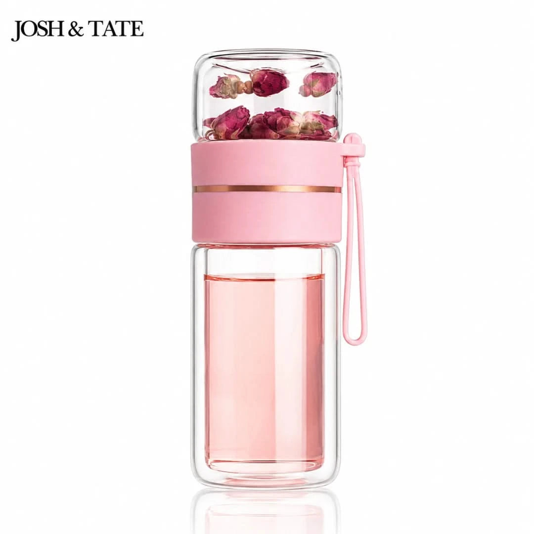 Josh & Tate - SteepSeal™ Tea-Water Separation Bottle - Pink water bottle with floral elements on a white background, featuring the brand 'Josh & Tate'.