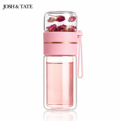 Josh & Tate - SteepSeal™ Tea-Water Separation Bottle - Pink water bottle with floral elements on a white background, featuring the brand 'Josh & Tate'.