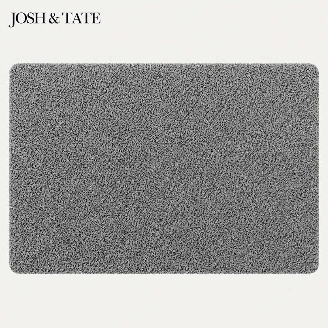 Josh & Tate - StepDry™ Anti-Slip Bath Mat - Gray textured mat with 'Josh & Tate' branding on a white background