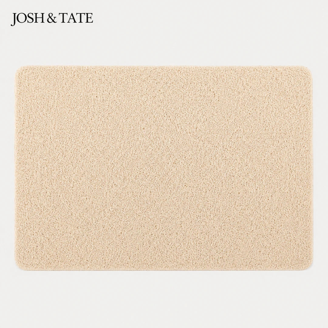 Josh & Tate - StepDry™ Anti-Slip Bath Mat - Beige bath mat with 'Josh & Tate' branding on a light gray background