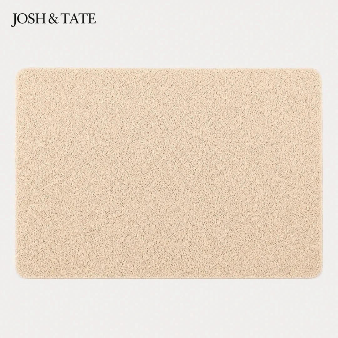 Josh & Tate - StepDry™ Anti-Slip Bath Mat - Beige bath mat with 'Josh & Tate' branding on a light gray background