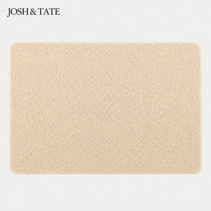 Josh & Tate - StepDry™ Anti-Slip Bath Mat - Beige bath mat with 'Josh & Tate' branding on a light gray background
