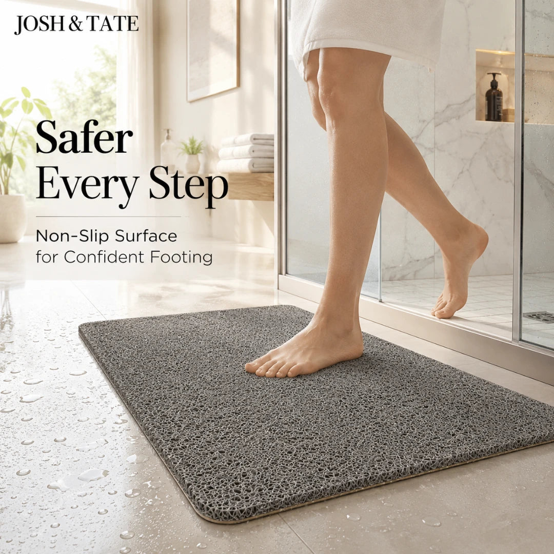 Josh & Tate - StepDry™ Anti-Slip Bath Mat - Gray bath mat with person stepping onto it, featuring Josh & Tate branding.