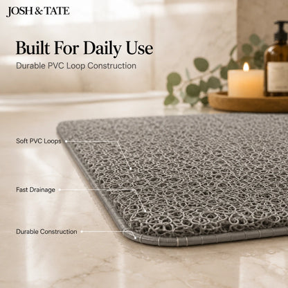 Josh & Tate - StepDry™ Anti-Slip Bath Mat - Gray bath mat with features labeled on a bathroom floor, featuring Josh & Tate branding.