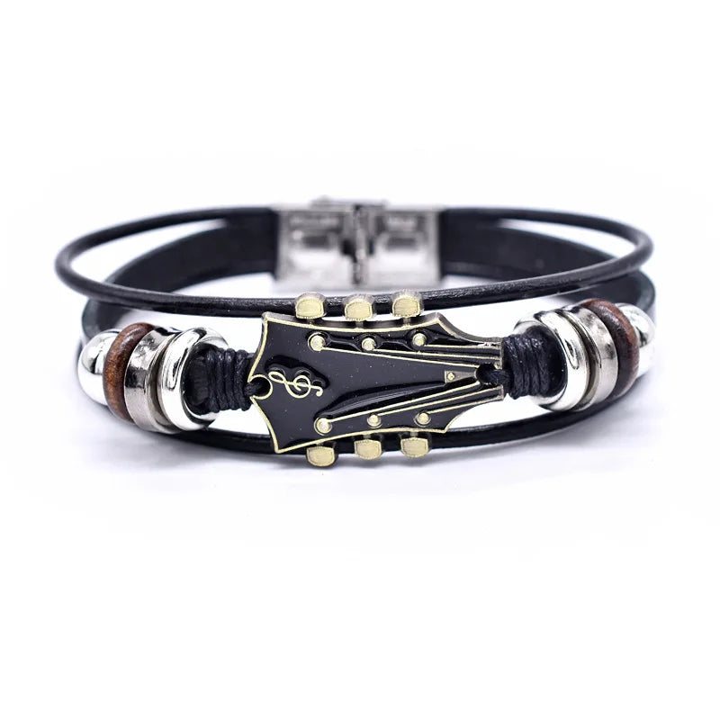 Black leather bracelet with metal and wooden accents on a white background