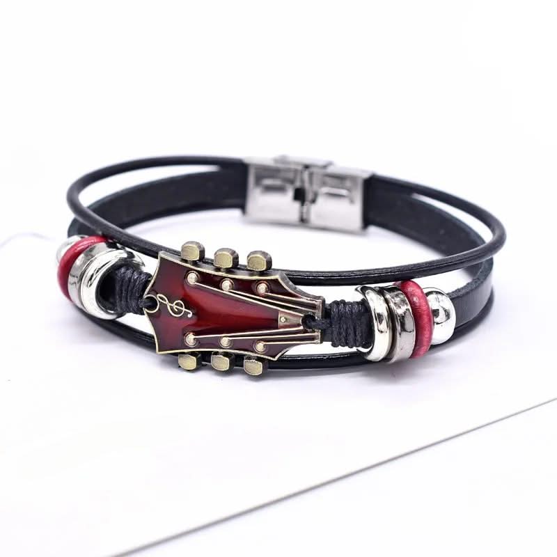 Black leather bracelet with guitar-shaped clasp on a white background