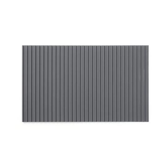 A gray non-slip mat with a ribbed texture designed to fit on a cutting board to provide stability during use.