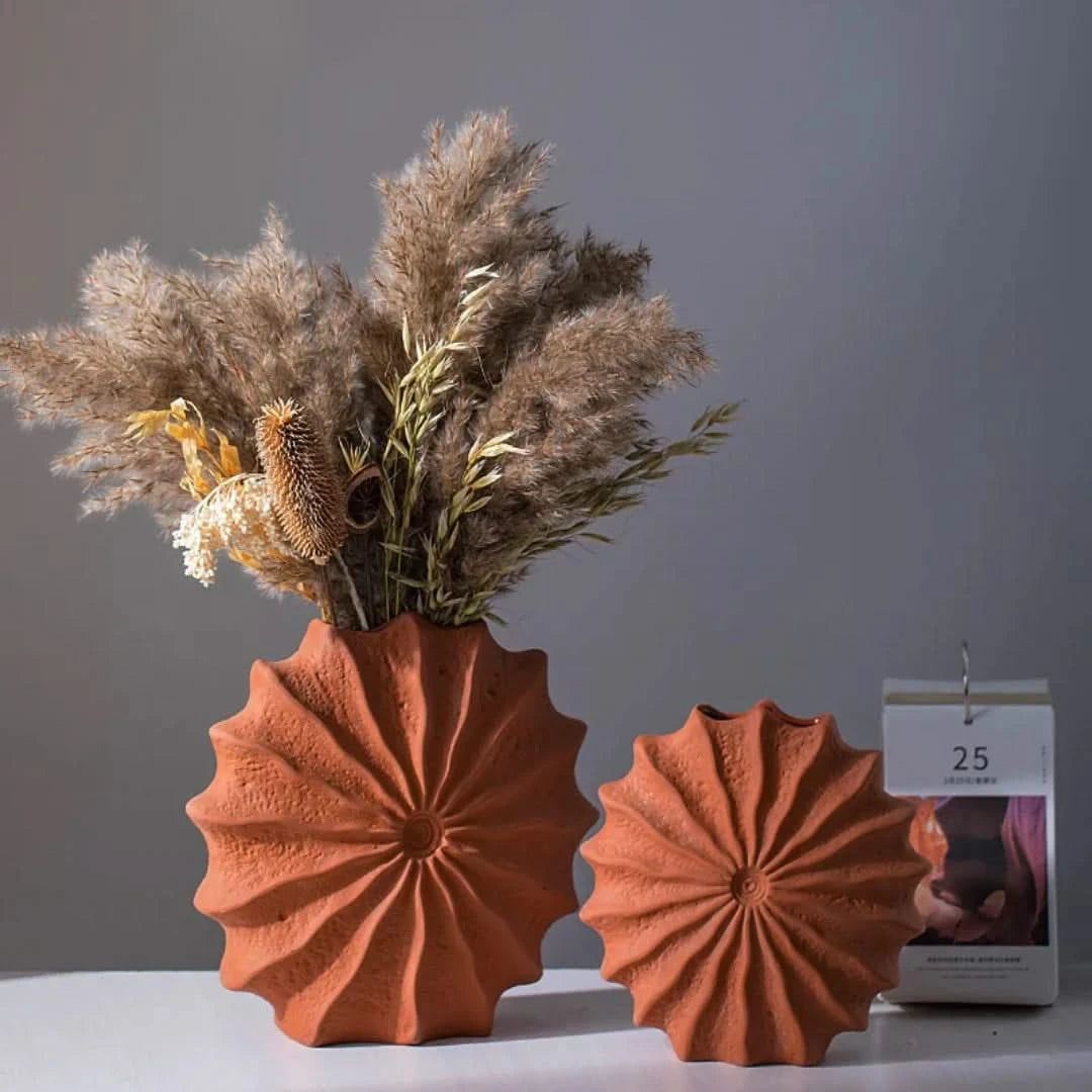 Josh & Tate - Terracotta Flower Vase - Two terracotta vases with a dried plant arrangement on a gray background