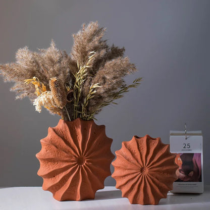 Josh & Tate - Terracotta Flower Vase - Two terracotta vases with a dried plant arrangement on a gray background
